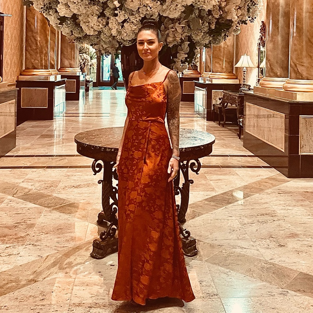 Burnt orange floral satin gown